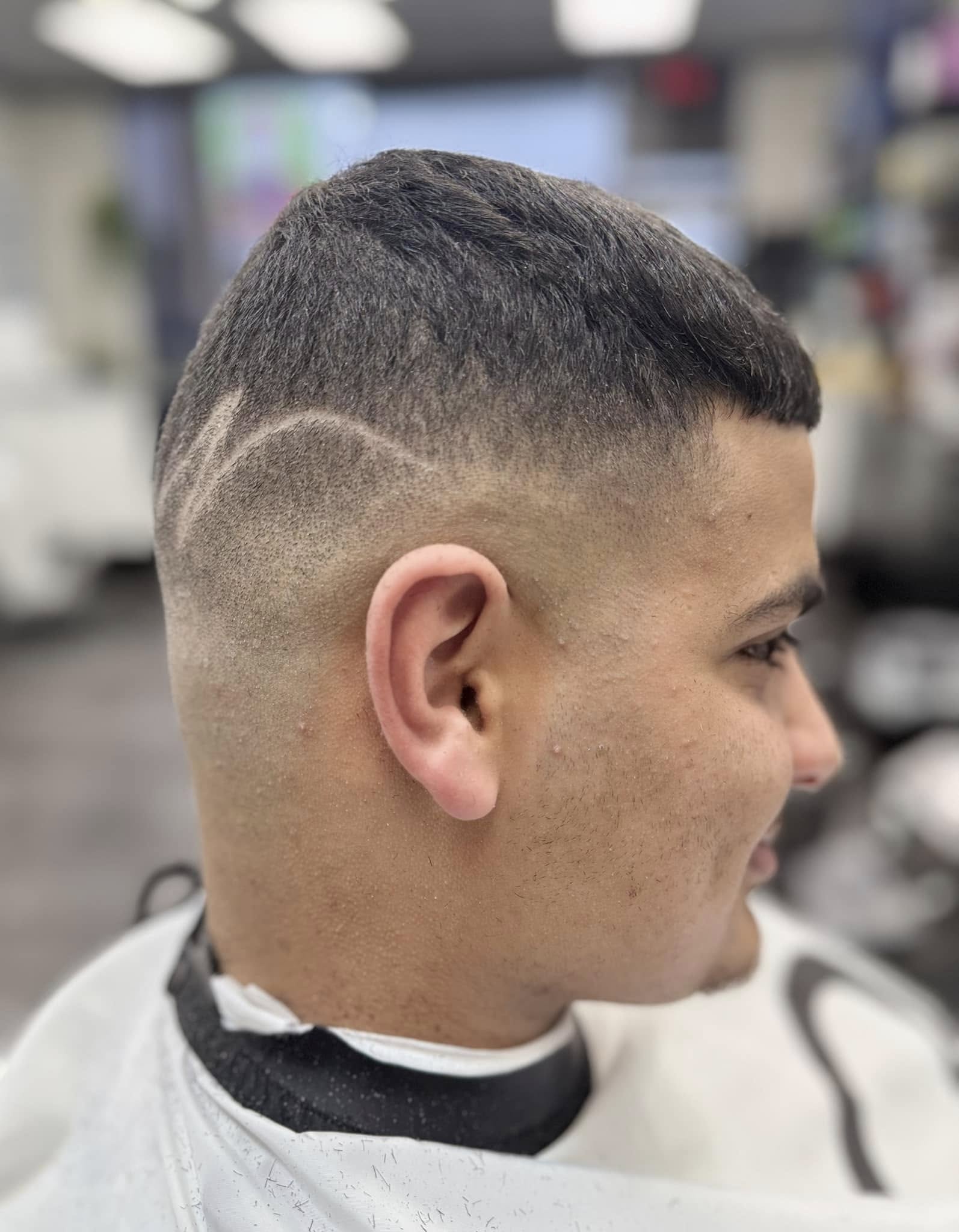 Tight fade and textured top.