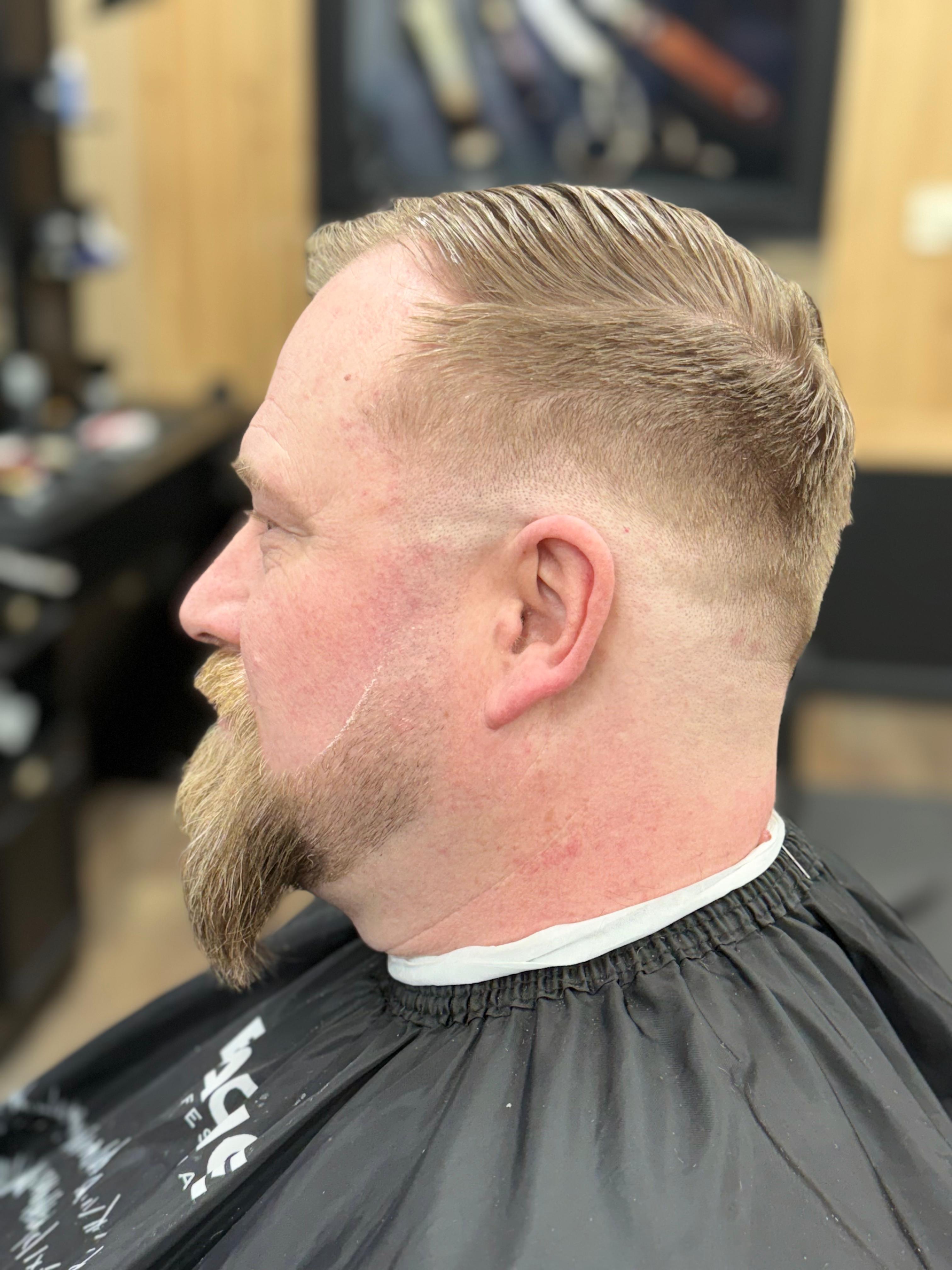 Fresh fade with beard detailing.